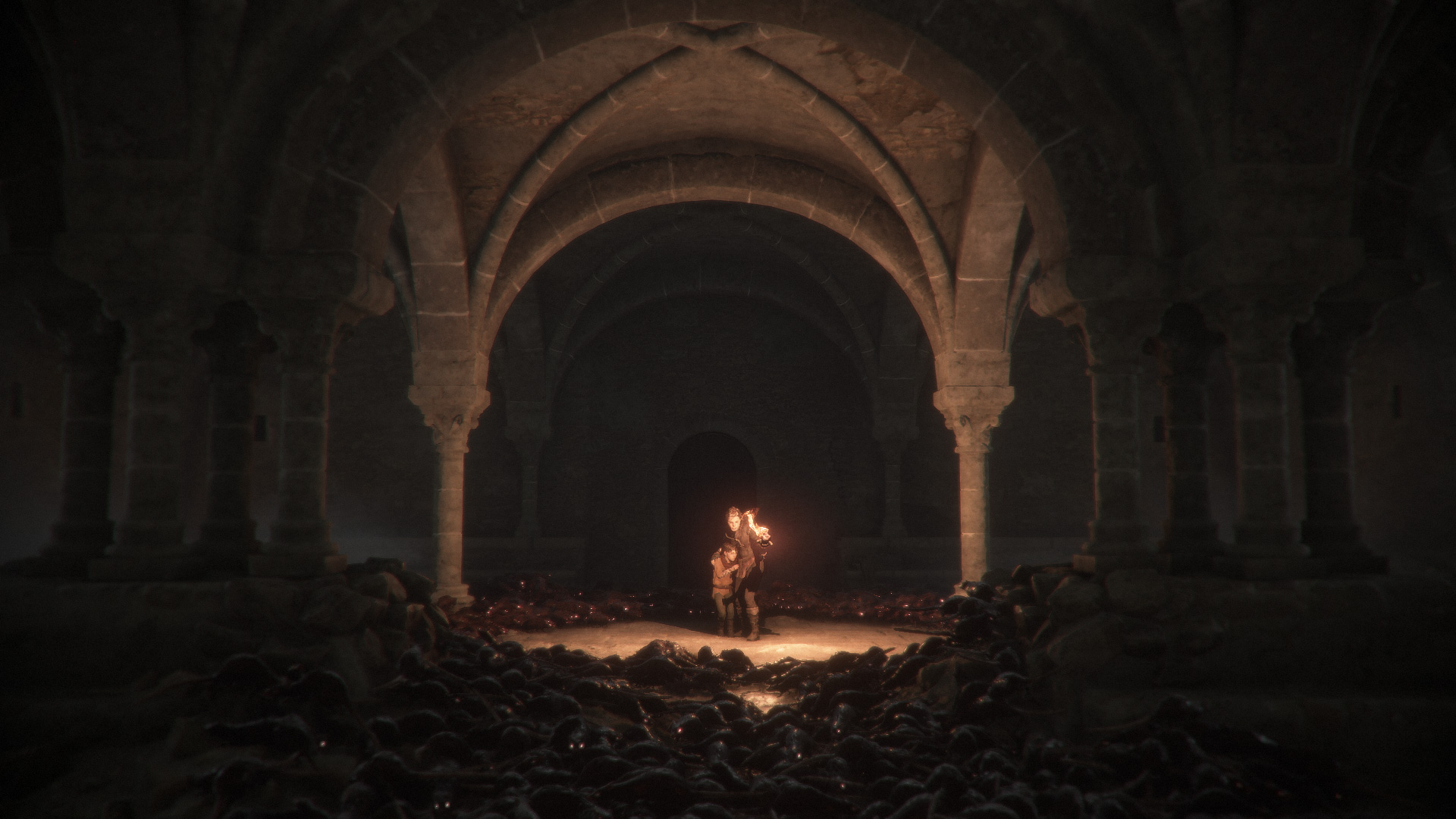 Amicia and Hugo shelter behind flames in A Plague Tale: Innocence